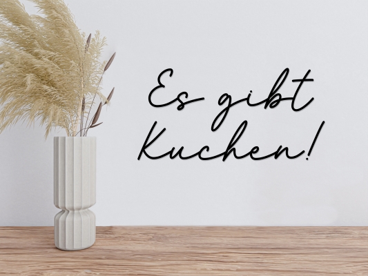 Schriftzug "Es gibt Kuchen"